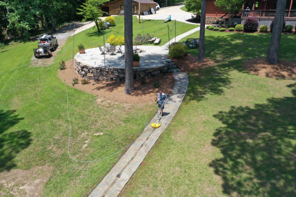 Lake Tuscaloosa Home's Concrete Walkways, Stone Patios, & Boat House Cleaned in Northport, AL
